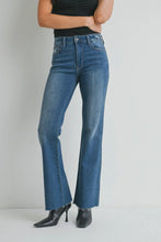 Load image into Gallery viewer, Person wearing blue jeans and black top on a plain background