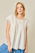 Load image into Gallery viewer, Woman wearing a white lace-trimmed top with a plain background