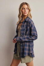 Load image into Gallery viewer, Woman wearing a blue plaid shirt over a green dress against a plain background