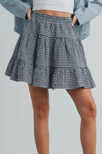Load image into Gallery viewer, Person wearing a checkered skirt with a plain background
