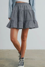 Load image into Gallery viewer, Person wearing a checkered skirt and high-top sneakers on a plain background