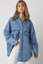 Load image into Gallery viewer, Woman wearing an oversized denim shirt against a plain background