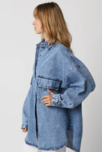 Load image into Gallery viewer, Person wearing an oversized denim jacket on a plain background