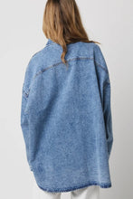 Load image into Gallery viewer, Person wearing a blue denim jacket on a plain background