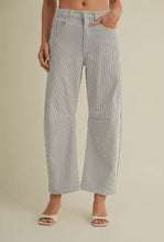 Load image into Gallery viewer, Person wearing light gray checkered pants on a beige background