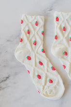 Load image into Gallery viewer, White socks with strawberry pattern on a marble background