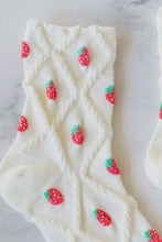 Load image into Gallery viewer, White socks with strawberry pattern on a marble surface