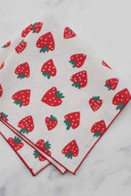 Load image into Gallery viewer, Set of red strawberry patterned napkins on a marble surface