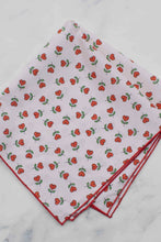 Load image into Gallery viewer, Folded fabric with red heart pattern on a white marble surface