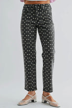 Load image into Gallery viewer, Black jeans with white polka dots worn by a person on a light gray background