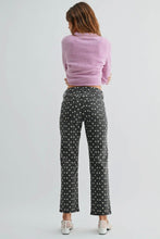 Load image into Gallery viewer, Woman wearing a pink sweater and polka dot pants on a white background