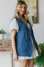 Load image into Gallery viewer, Woman wearing a denim vest over a white dress in a home setting