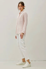 Load image into Gallery viewer, Person wearing a light pink shirt and white pants on a plain background