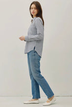 Load image into Gallery viewer, Woman wearing a striped shirt and blue jeans on a plain background