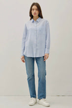 Load image into Gallery viewer, Person wearing a light blue shirt and jeans on a white background