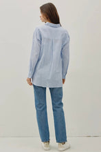Load image into Gallery viewer, Person wearing a light blue shirt and jeans on a plain background