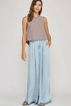 Load image into Gallery viewer, Woman wearing a checkered top and light blue denim skirt on a white background