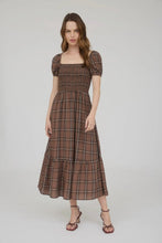 Load image into Gallery viewer, Woman wearing a brown plaid dress on a white background