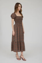 Load image into Gallery viewer, Woman wearing a brown checkered dress on a white background