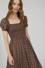 Load image into Gallery viewer, Woman wearing a brown plaid dress on a white background
