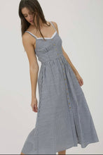 Load image into Gallery viewer, Woman wearing a gray and white striped dress on a plain background