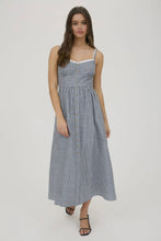 Load image into Gallery viewer, Woman wearing a blue and white striped dress on a white background