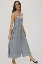 Load image into Gallery viewer, Woman wearing a blue and white striped dress on a plain background
