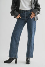 Load image into Gallery viewer, Person wearing blue jeans and a black leather jacket on a white background
