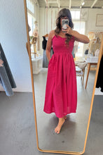 Load image into Gallery viewer, Person wearing a pink checkered dress taking a mirror selfie.