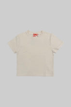 Load image into Gallery viewer, Beige t-shirt with a red and white logo on a light gray background
