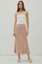 Load image into Gallery viewer, Woman wearing a white strapless top and floral skirt on a white background