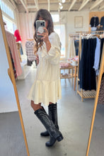 Load image into Gallery viewer, Person taking a mirror selfie wearing a white dress and black knee-high boots in a store.