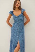Load image into Gallery viewer, Woman wearing a blue floral dress with a white background