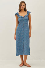 Load image into Gallery viewer, Woman wearing a blue floral dress on a white background