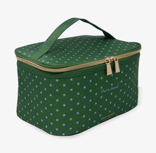 Load image into Gallery viewer, A green zippered cosmetic bag with a light blue polka dot pattern, featuring a top handle, gold-tone zipper, and 'Kate Spade New York' branding on a white background.