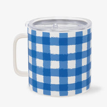 Load image into Gallery viewer, A white ceramic mug with a blue and white gingham checkered pattern, featuring a clear plastic lid and a white handle, shown on a light gray background.
