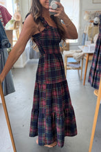 Load image into Gallery viewer, Woman wearing a plaid dress taking a mirror selfie in a store.