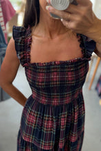 Load image into Gallery viewer, Woman wearing a plaid dress taking a mirror selfie.