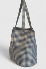 Load image into Gallery viewer, Checkered tote bag with a strap on a light gray background