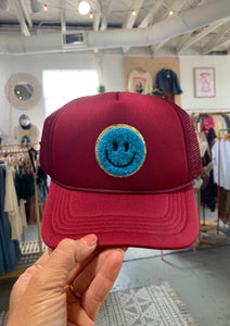 Burgundy + Turquoise Smiley Trucker Hat