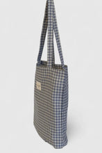 Load image into Gallery viewer, Checkered tote bag with a visible brand label on a white background