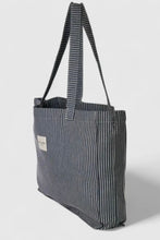 Load image into Gallery viewer, Black and white striped tote bag on a light gray background