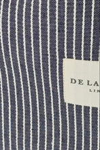 Load image into Gallery viewer, Close-up of a navy and white striped fabric with a label on a navy background