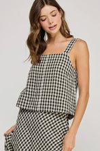 Load image into Gallery viewer, Woman wearing a black and white checkered top and skirt on a plain background