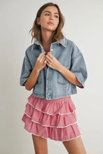 Load image into Gallery viewer, Woman wearing a denim jacket over a red and white checkered dress on a plain background