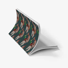 Load image into Gallery viewer, Notebook with a colorful animal pattern on a white background