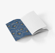 Load image into Gallery viewer, Open notebook with a blue page featuring bird illustrations on a white background