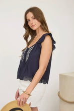 Load image into Gallery viewer, Woman wearing a navy sleeveless top with lace details against a white background