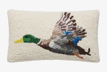 Load image into Gallery viewer, A rectangular cream-colored textured throw pillow featuring a hand-tufted, raised duck in flight design with green, yellow, brown, gray, and blue details, shown against a plain white background.