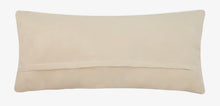 Load image into Gallery viewer, A rectangular lumbar pillow in a light beige or cream color, shown from the back with a stitched seam detail, on a plain white background.